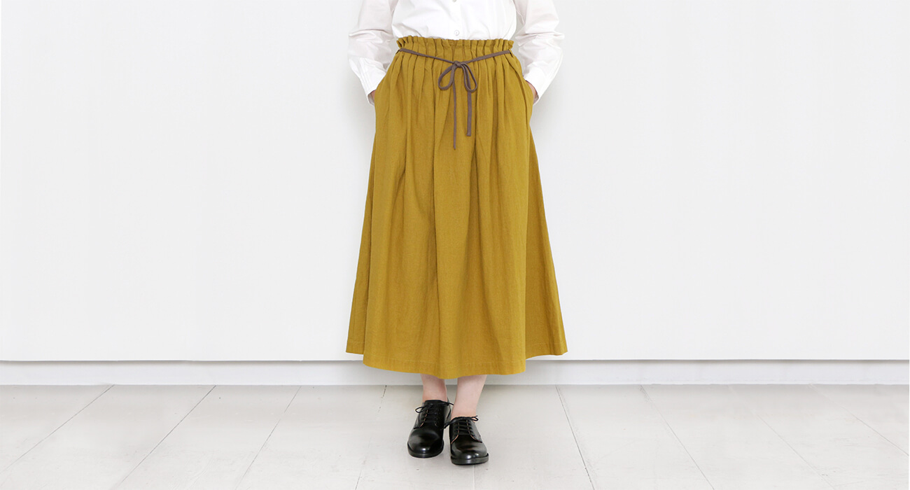 mumokuteki×LILASIC / ウエストタックプリーツロングスカート特集2” width=