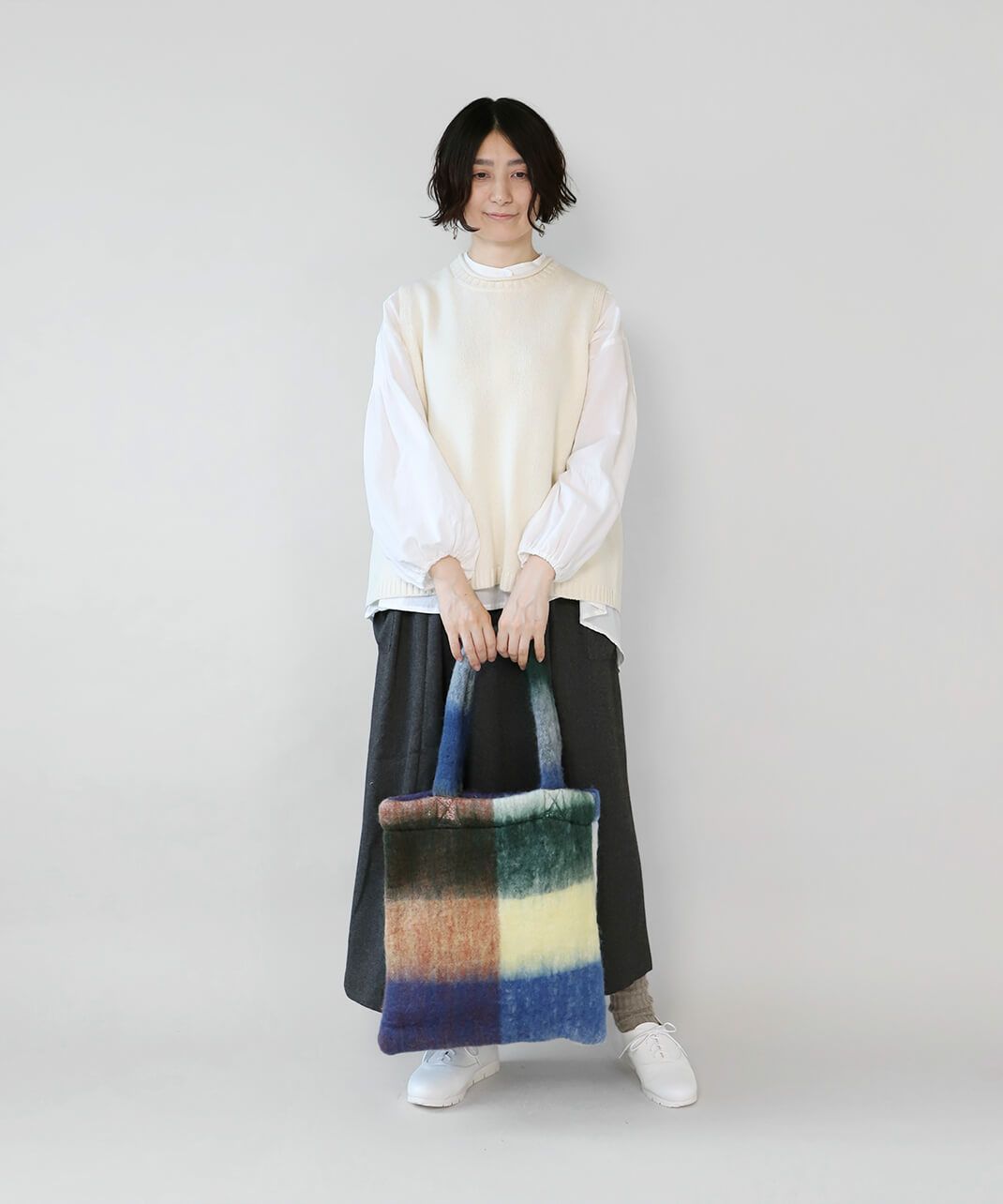 目を惹く大きなチェック柄がポイント