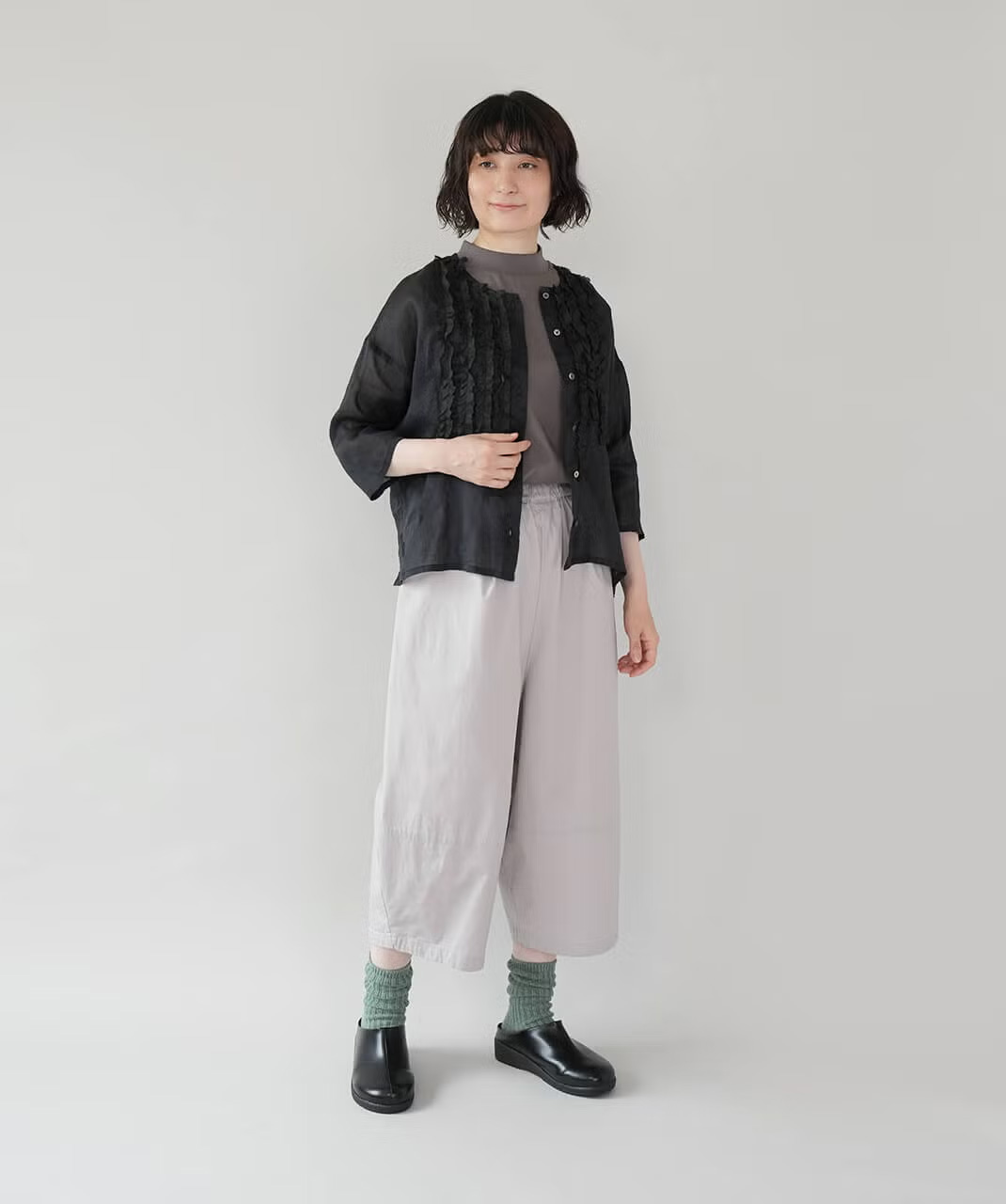 チェック柄がコーディネートのアクセントに。