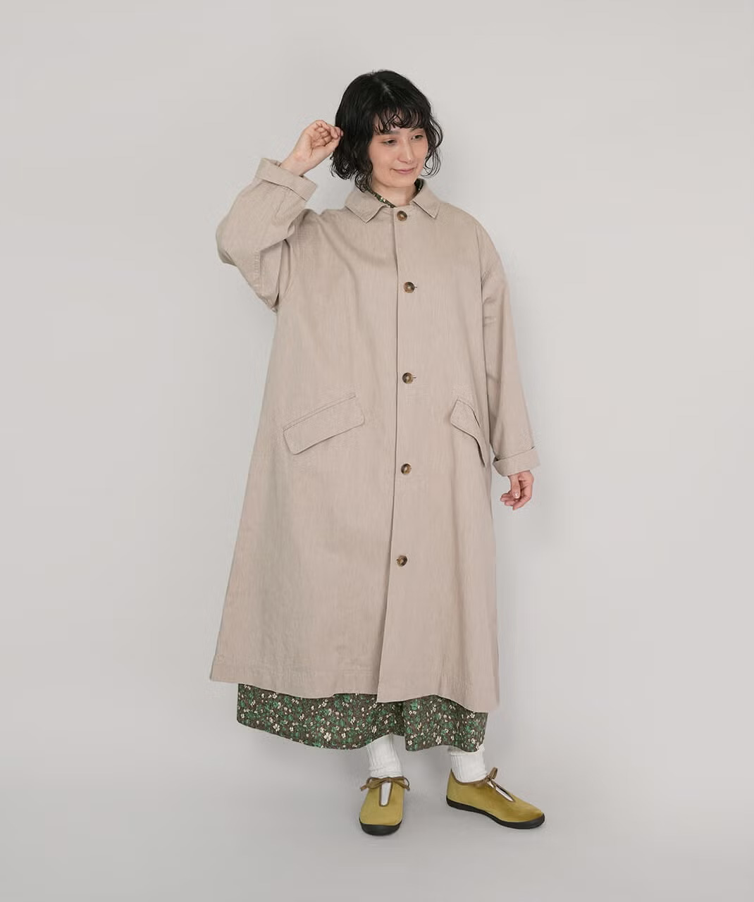 袖口を折り返したコーディネート